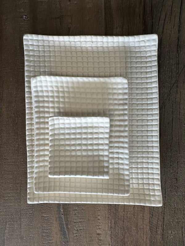 Ceramic grid plates